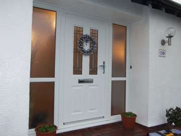 Bromborough Wirral : Installation of a Jacobean Aluminium Composite door with triple glazed side panels ; Decoration by others! 